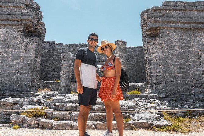 Explore Tulum ruins and Coba site with Transportation and Guide - Visiting the Tulum Archaeological Site with a Coastal View