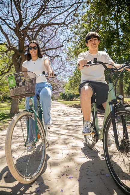Express Bike Tour: History of Valencia + Paella at a Local Restaurant - Pedaling Through Turia Park