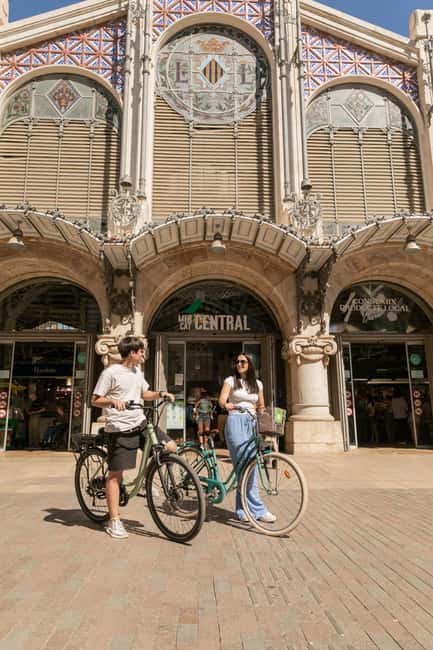 Express Bike Tour: History of Valencia + Paella at a Local Restaurant - Savoring Valencia’s Signature Paella
