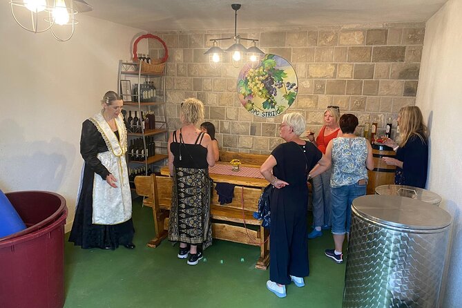 Family-run Vineyard Tour & Award Winning Wine Tasting/Delicacies - Walking Through Olive and Almond Orchards