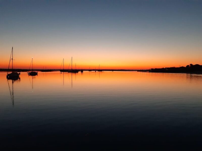 Faro: Ria Formosa Sunset Boat Tour - Exploring Ria Formosa’s Iconic Islands: Deserta and Farol