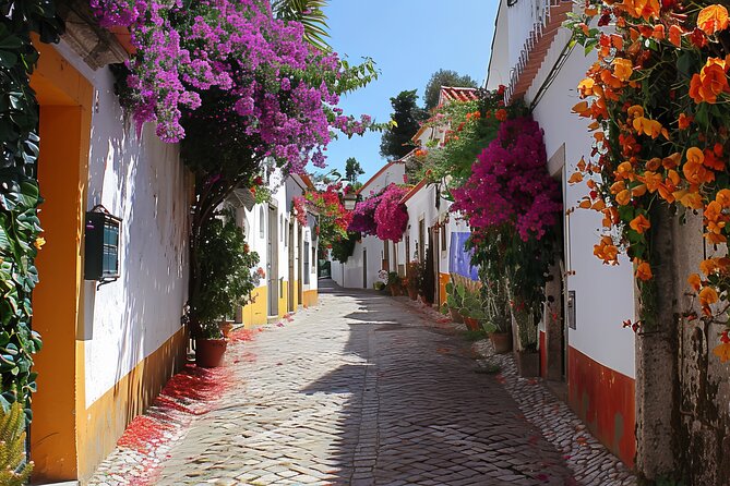Fatima, Batalha, Nazare, Obidos Small Group Tour From Lisbon - Nazaré’s Coastal Charm and Record-Breaking Waves