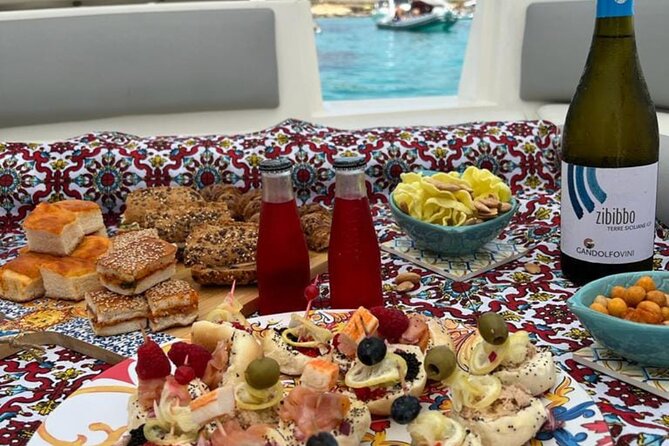 Favignana inflatable boat tour, wine tasting, snorkeling and relaxation - Free Time in Favignana Town