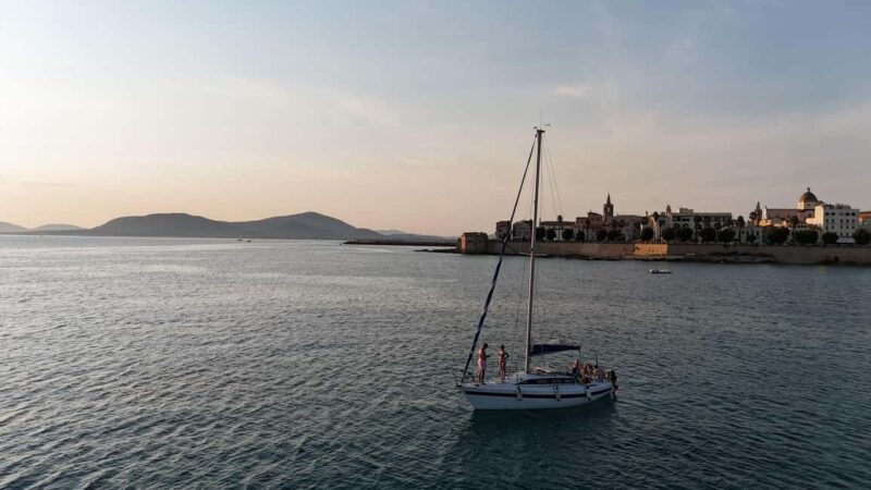 Fertilia: Sunset Sail with a Sardinian Aperitif - The Sailing Experience: Participatory and Relaxing