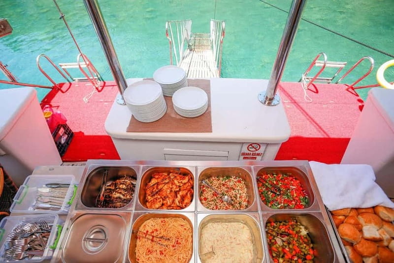 Fethiye: 12 Islands Boat Tour with Lunch and Hotel Transfer - Scenic Return and Sunset Views