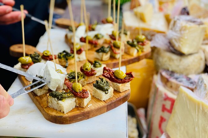 Flavors of Naples Decumani Street Food and Sightseeing Tour - Starting at Piazza Bellini: The Vibrant Heart of Naples