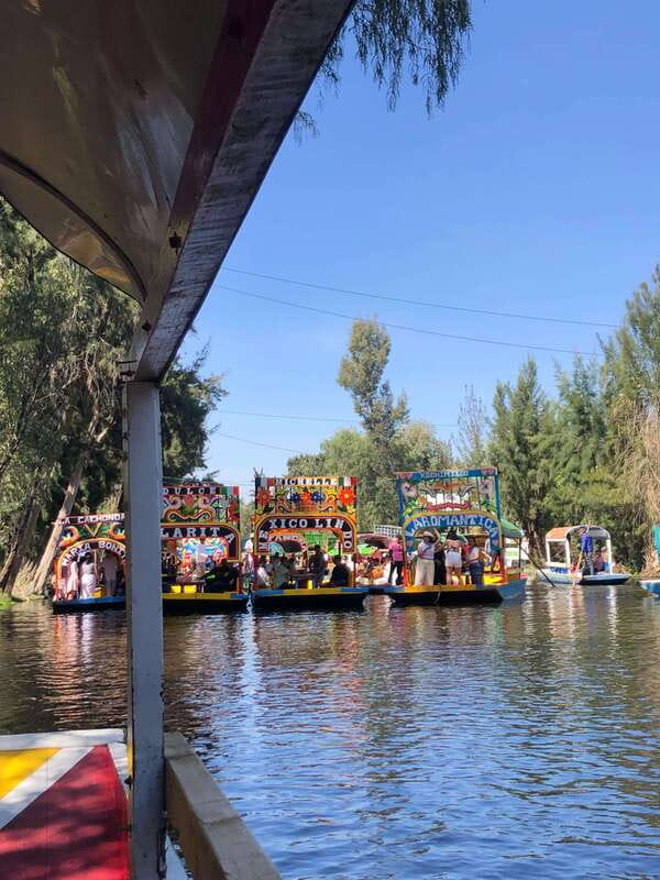 "Floating Party in Xochimilco: Canals, Tequila, and Tradition" - Explore the Vibrant Canals of Xochimilco with a Cultural Floating Party