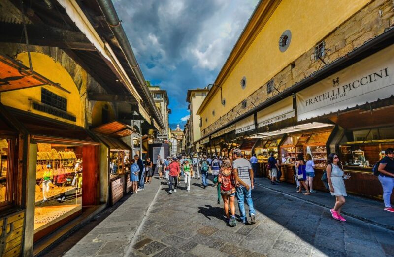 Florence: City guided walking tour - Crossing the Ponte Vecchio and Enjoying Its Views