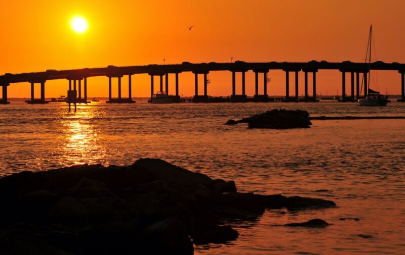 Florida: Emerald Coast Sunset & Dolphin Cruise with Guide - Key Points