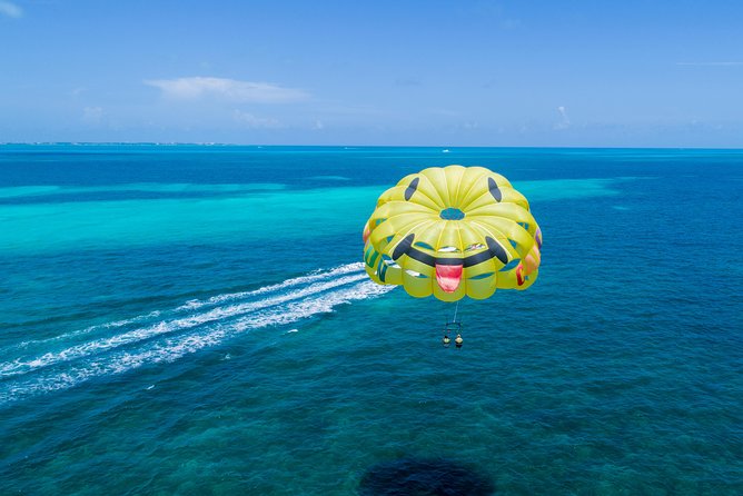 Fly Above Cancun Bay: Parasailing Experience - Key Points