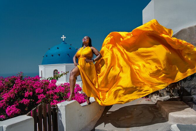 Flying Dress Photoshoot in Oia Private entry to Blue Dome - Flexible Cancellation and Booking in Advance