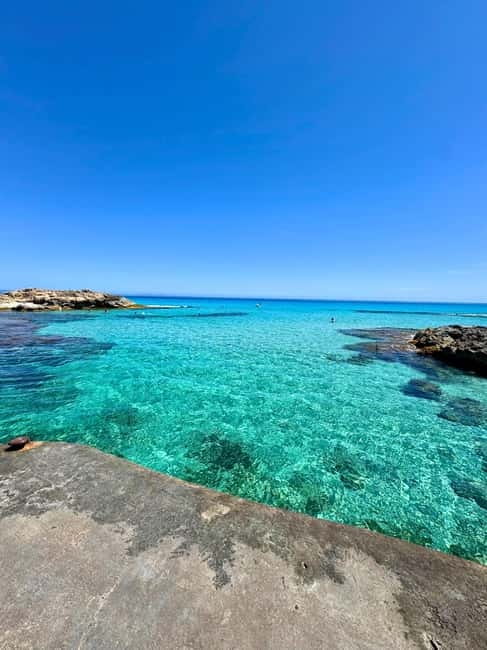 Formentera: Hidden Spots 4X4 Tour in Land Rover Defender - First Stop: Relaxing at Platja de Migjorn with Snorkeling Gear