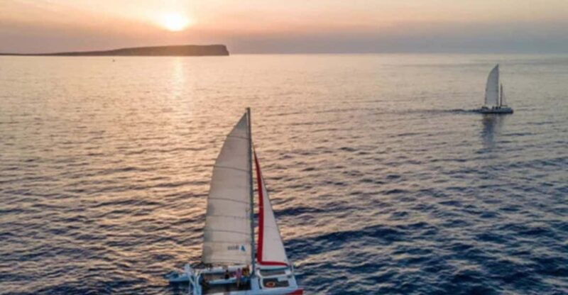 Fornells: Catamaran Sunset Cruise of Menorca's Coast - Experience the Magic of Menorca’s Coast on a Sunset Catamaran Tour