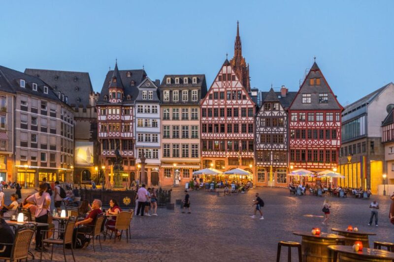 Frankfurt: Highlights and New Old Town English-Language Tour - Iconic Eiserner Steg Footbridge and Museum Embankment Views