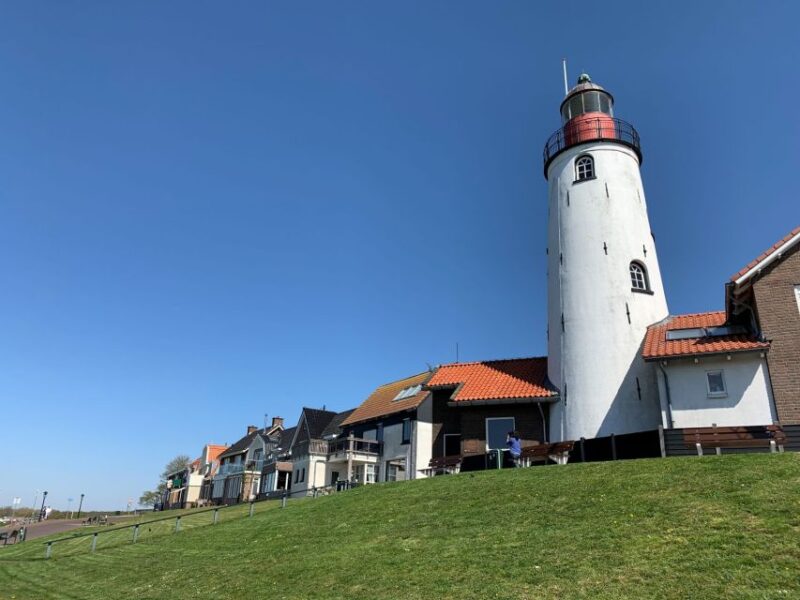 From Amsterdam: 4 Provinces Highlights Van Tour - Discovering Zaanse Schans Windmills at Dawn