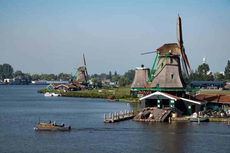 From Amsterdam: Experience Zaanse Schans Windmills & Cheese - Exploring Windmills and Their Role in Dutch Heritage