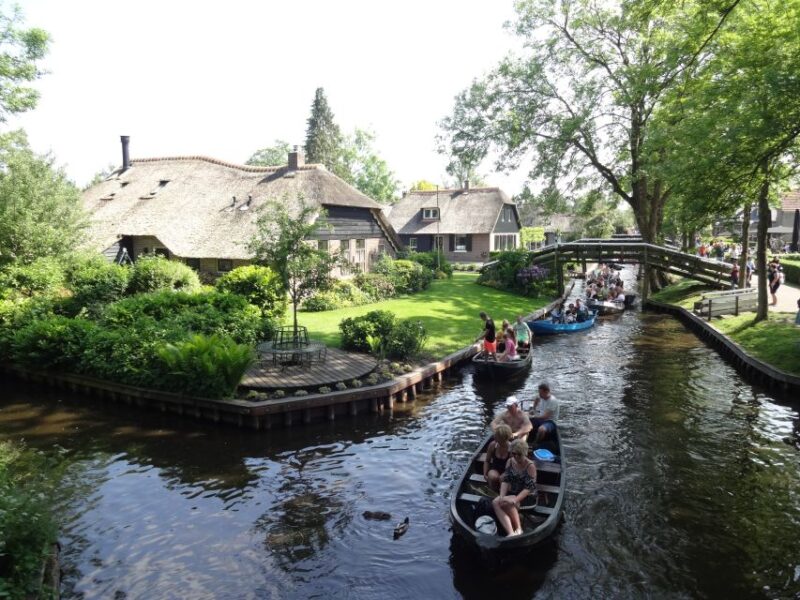 From Amsterdam: Giethoorn Day Trip with Small Electric Boat - Walking and Cycling Through the Village
