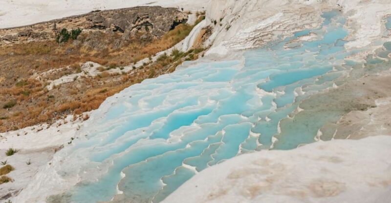 From Antalya/Kemer: Pamukkale and Hierapolis Tour with Lunch - Pamukkale’s White Travertine Terraces and Mineral Waters