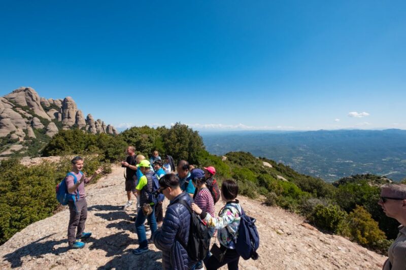 From Barcelona: Montserrat Monastery, Easy Hike, Cable Car - Cable Car Ride to the Mountains Peak