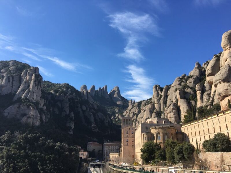 From Barcelona: Montserrat Mountain Hike and Abbey Tour - Practical Details: Meeting Point and Group Size