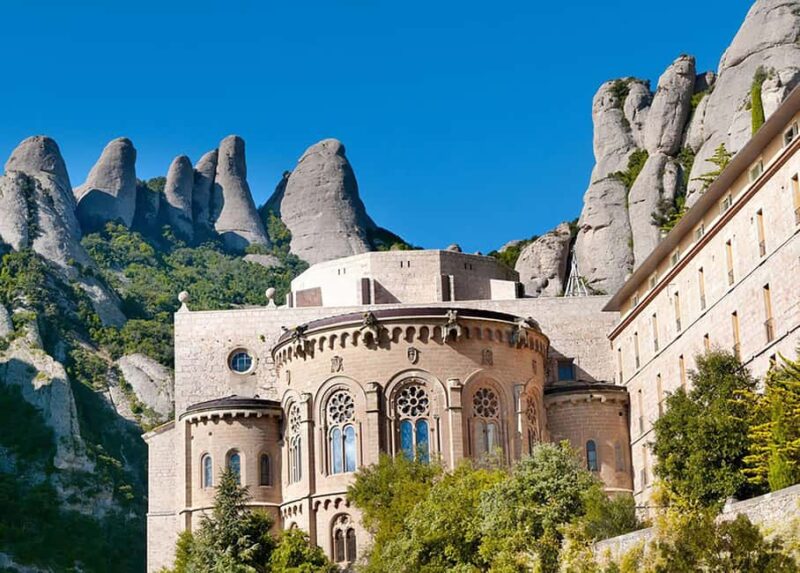 From Barcelona: Montserrat Tour with Cog-Wheel Train Ride - Key Points