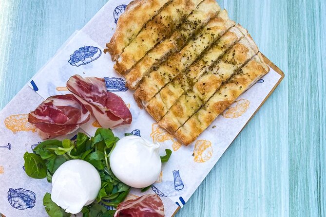 From Bari: Visit Polignano a Mare with street food tour - Scenic Coastal Views and Photo Opportunities