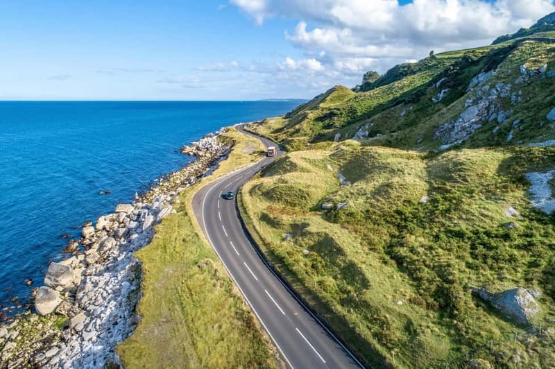 From Belfast: Full-Day Giants Causeway Land and Boat Tour - Boat Tour Along the Causeway Coastal Route