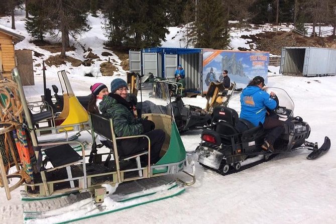 From Bolzano - Snowmobile + Sledding and The Great Dolomites Road Private Tour - Snowmobiling and Sledding at the Mountain Refuge
