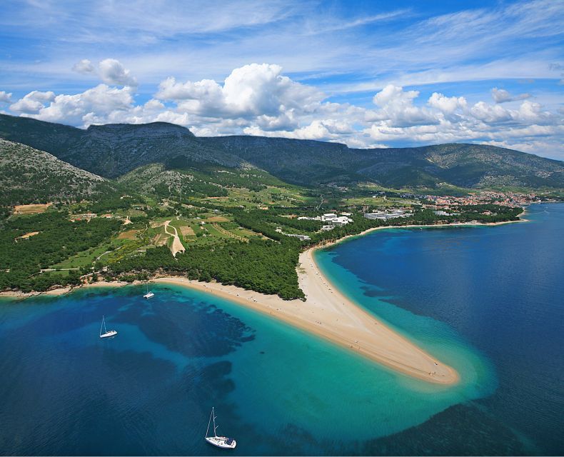 From Bra: Panoramic Flight over Bra, Hvar, olta, & Split - View Zlatni rat Beach Near Bol from the Sky