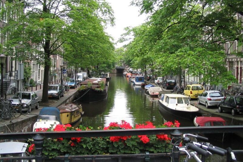 From Brussels: Cheese, Clogs & Windmills Amsterdam Day Trip - Guided Bus Tour of Amsterdam Highlights