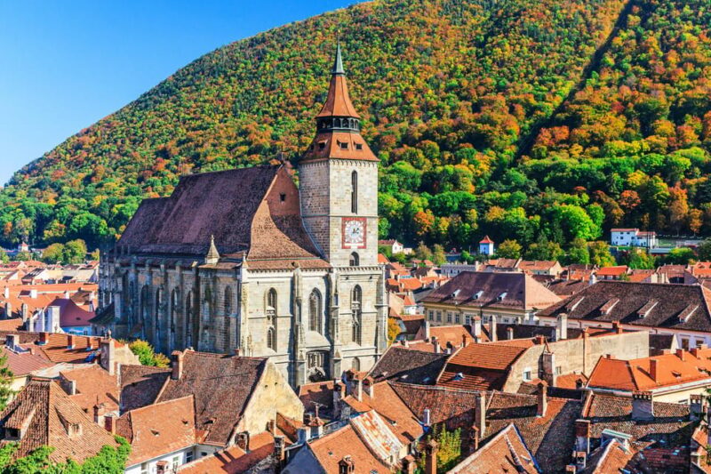 From Bucharest : Day Trip to Peles, Dracula's Castle, Brasov - Discovering Brasov’s Medieval Charm on a Guided Walk