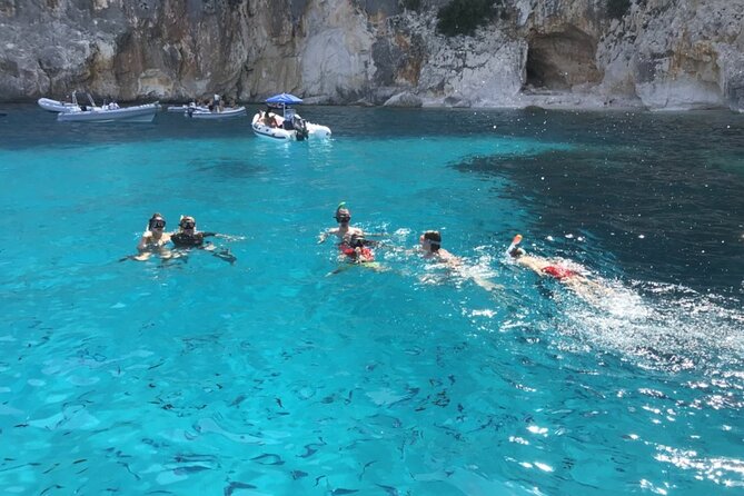From Cala Gonone: Dinghy trip in the Gulf of Orosei - The Spacious Cala Sisine and Its Green Setting