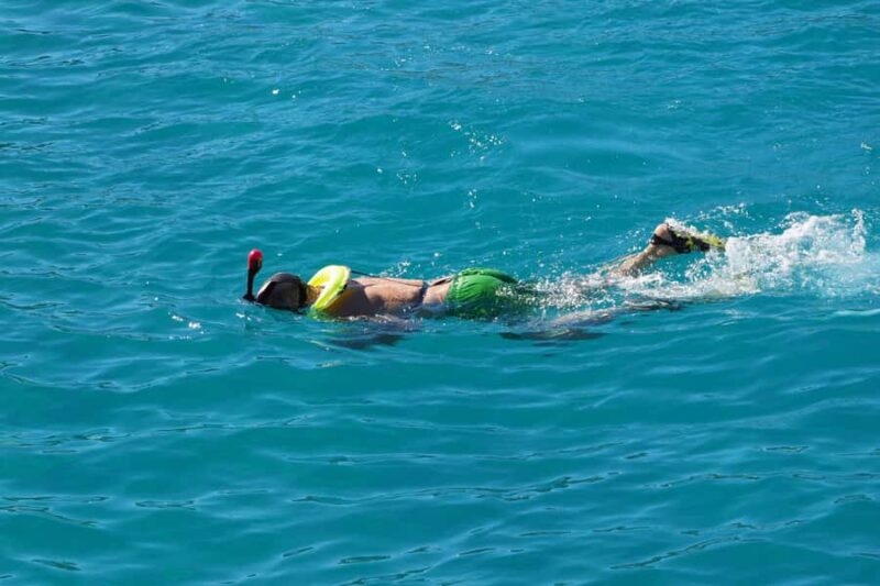 From Cancun: Hop on a catamaran and chill out on Isla Mujeres with a buffet lunch - Exploring Isla Mujeres at Your Own Pace: Shops, Beaches, and Relaxation