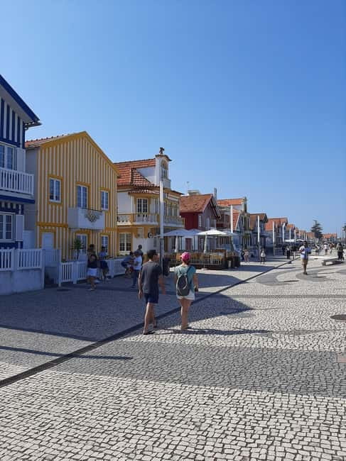 From Coimbra: Tour to Aveiro, Costa Nova beach, and Moliceiro boat ride - Key Points