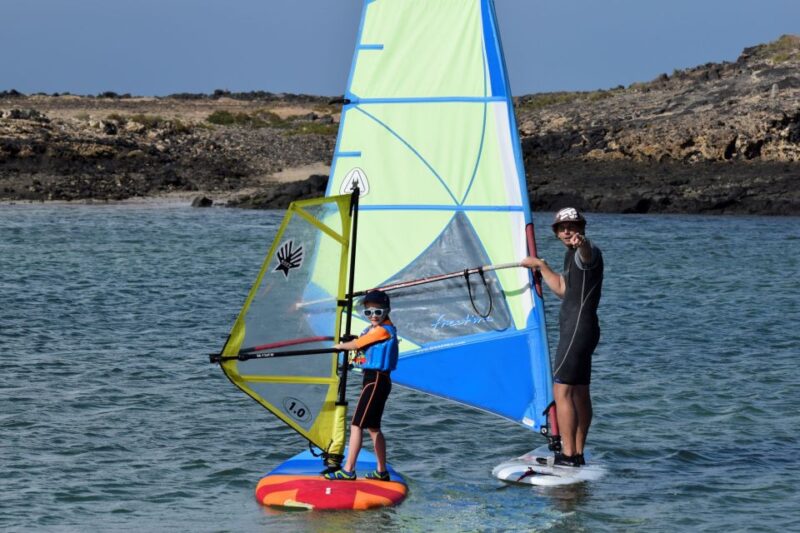 From Corralejo: Small Group Windsurfing Class in El Cotillo - All-Inclusive Equipment and Safety Gear