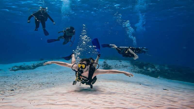 From Cozumel: Double Tank Scuba Diving for Certified Divers - Practical Details: Duration, Equipment, and Park Entry