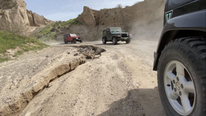 From Fira: Santorini Wrangler Jeep Convoy Tour & Villages - Exploring Emporio’s Windmills and Vlychada’s Port