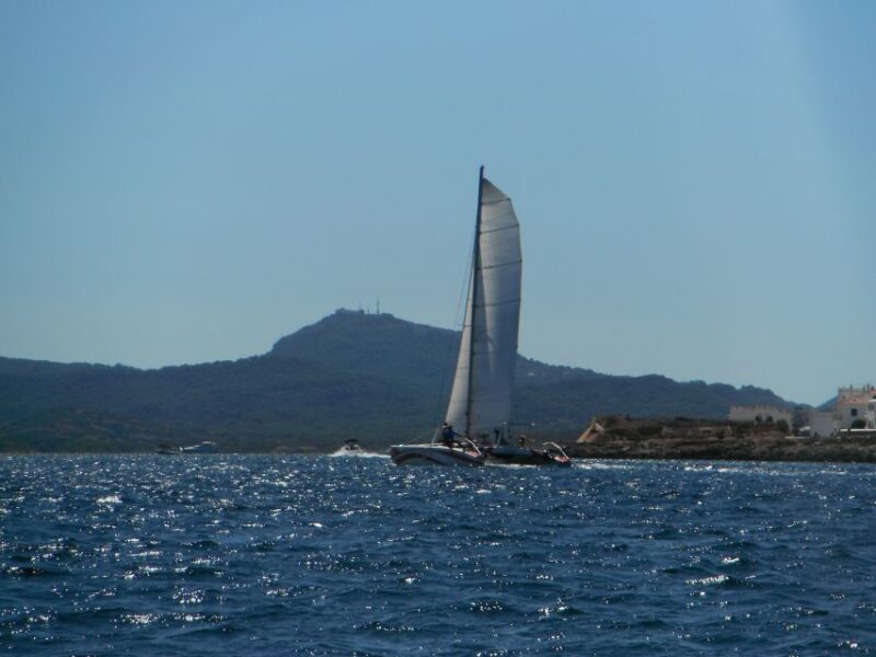 From Fornells: Half-Day Menorca Catamaran Trip w/ Snorkeling - Snorkeling in Calm Mediterranean Waters