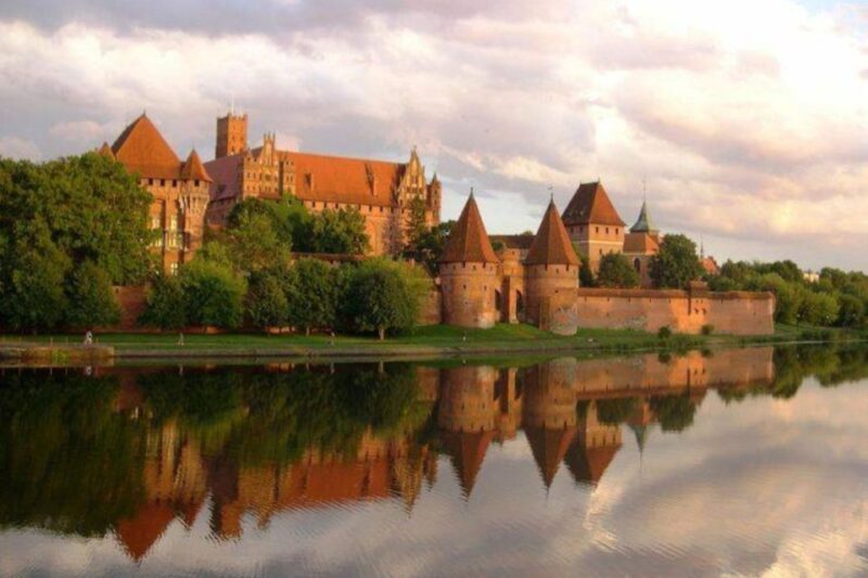 From Gdansk: Malbork Castle Trip with Ticket and Audio Guide - Inside Malbork: The Grand Masters Palace and Main Rooms