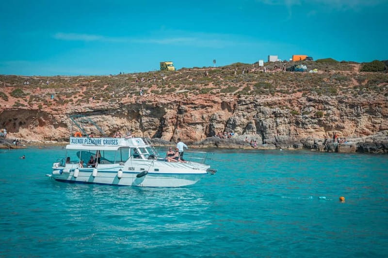 From Gozo:Around Comino, Blue Lagoon, Crystal Lagoon & Caves - Comino’s Coastline: A Scenic Rundown