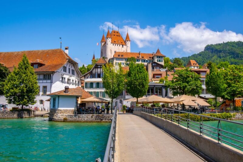 From Interlaken: Beatus Caves, Blue Lake and Lake Thun Tour - Cross the Sigriswil Suspension Bridge for Spectacular Views