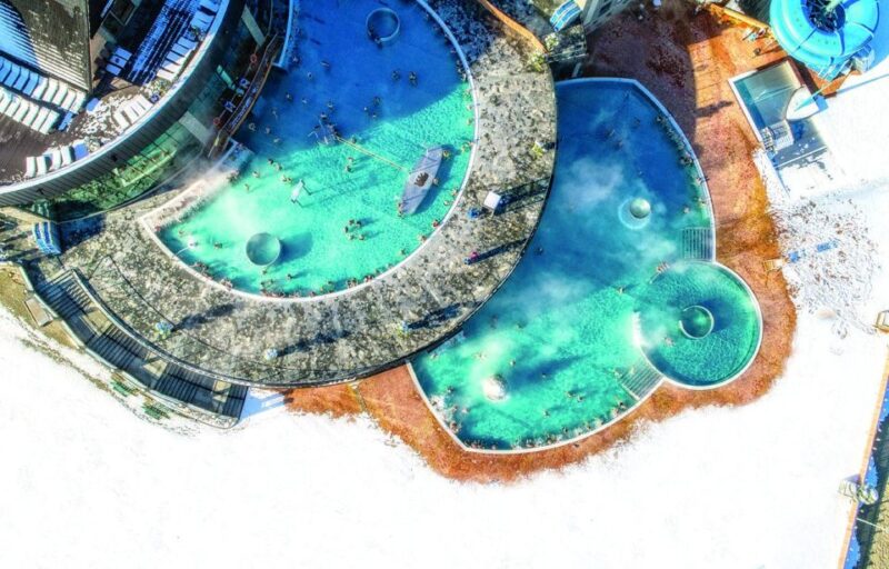 From Krakow: Snowmobile adventure and Thermal Baths tour - Snowmobile Ride in the Tatra Mountains