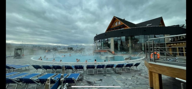 From Krakow: Snowmobile, Zakopane & Chochoowskie Baths - Sampling Traditional Oscypek at the Firepit