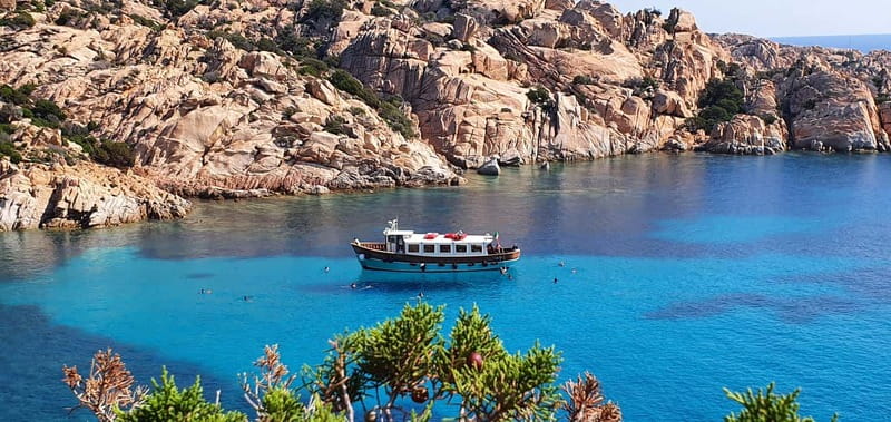 From La Maddalena or Palau: Archipelago Boat Tour - Exploring the La Maddalena Archipelago in a Vintage Motorboat