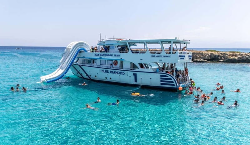 FROM LATCHI: Blue Lagoon Akamas Cruise - large water slide - Snorkeling near the Manolis Sea Caves