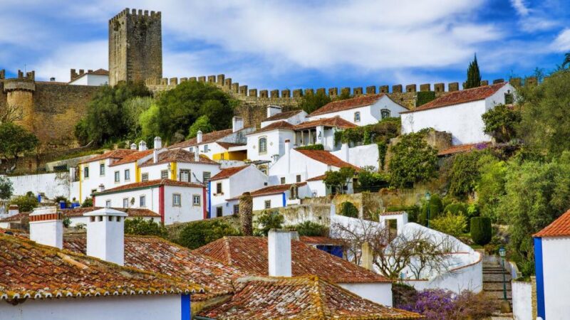 From Lisboa: Fatima, Nazare, Obidos & Batalha Full Day Tour - Experiencing Nazaré’s Famous Waves and Coastal Charm