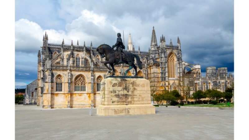 From Lisbon: Fatima, Nazare and Obidos Luxury Private Tour - Visiting Batalha Monasterys Architectural Marvel