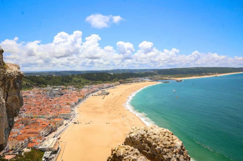 From Lisbon: Fátima, Óbidos, and Nazaré Small Group Day Tour - Nazaré’s Cliffs, Waves, and Surf Culture