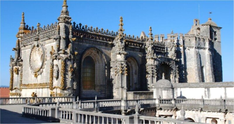 From Lisbon: Private Full-Day Tour to Tomar and Coimbra - Relaxing Moments at the Mondego River and Santa Clara-a-Velha Monastery