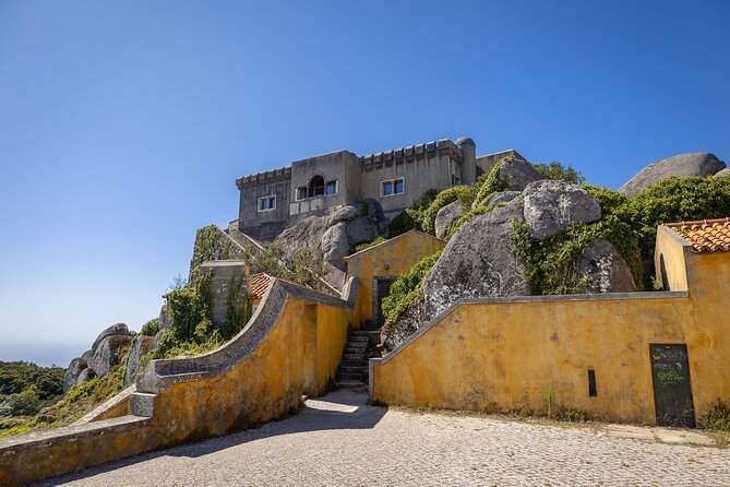 From Lisbon: Sintra, Pena Palace and Regaleira - Round-Trip Transfer and Final Return to Lisbon